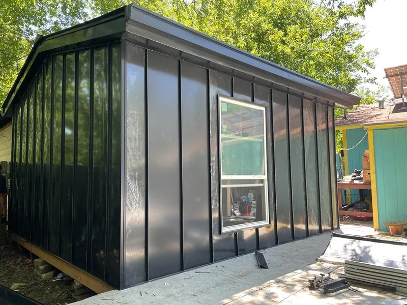 Black standing seam metal wall panels for Roof Inspection in Manheim