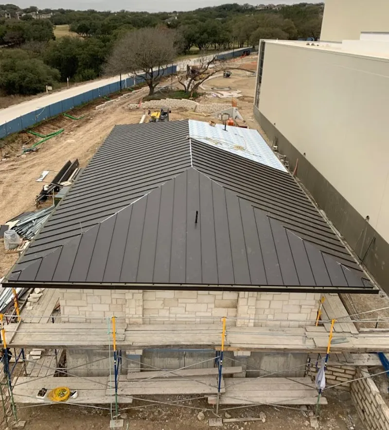 Metal roof new construction with scaffolding in Manheim